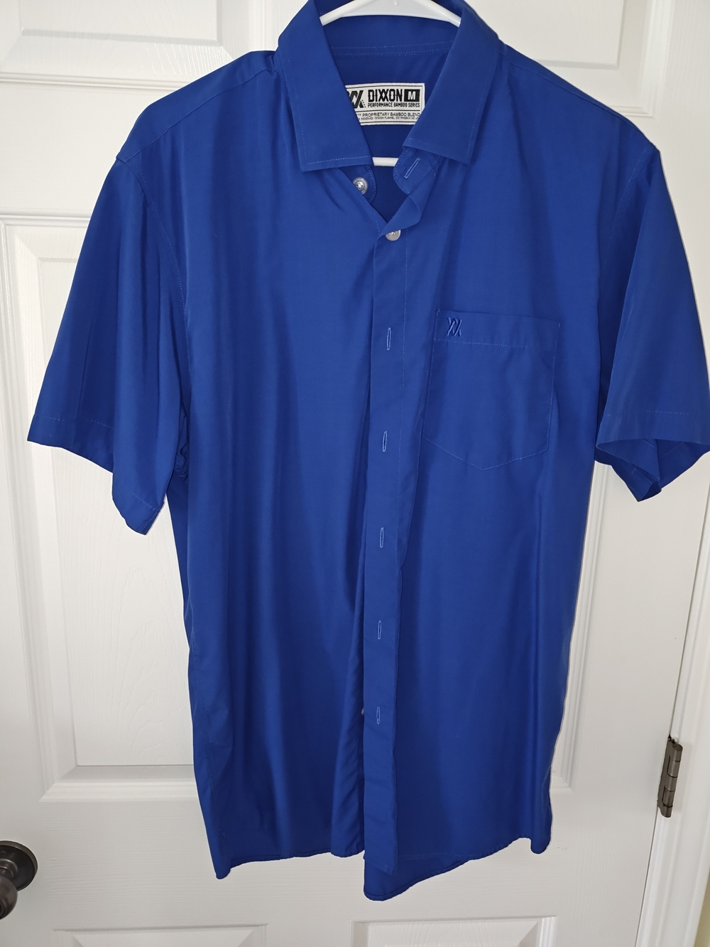 Dixxon Performance Bamboo Series short sleeve button up in men’s size Medium. EC